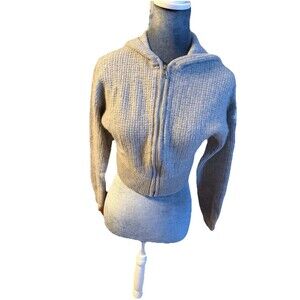 Alo Yoga Cashmere Plush Waffle Cropped Zip Hoodie in Athletic Heather Grey.